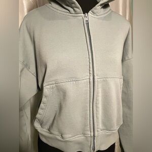 Tna COZYAF Cropped Full Zip Hooded Sweatshirt.